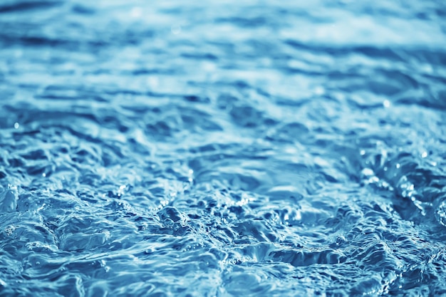 Blue background texture water surface flow, abstract water\
surface