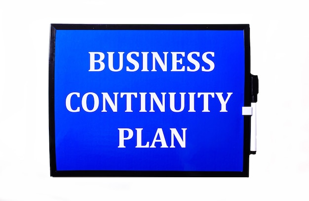 On a blue background a white inscription BUSINESS CONTINUITY PLAN