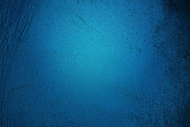 Blue background with stone texture background toned classic blue color