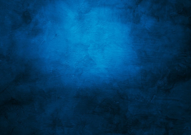 Blue background with stone texture background toned classic blue color