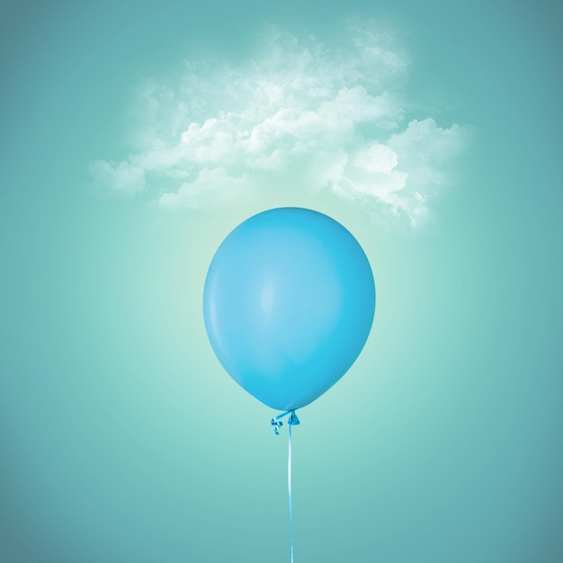 Photo blue ballon on pastel