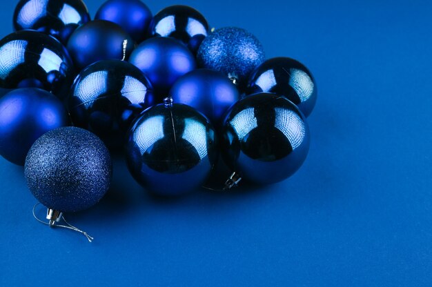 Blue balls laid out on a blue background. High quality photo