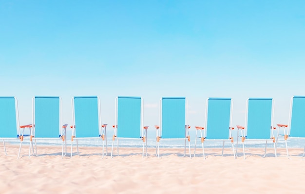 Blue beach chairs against sea