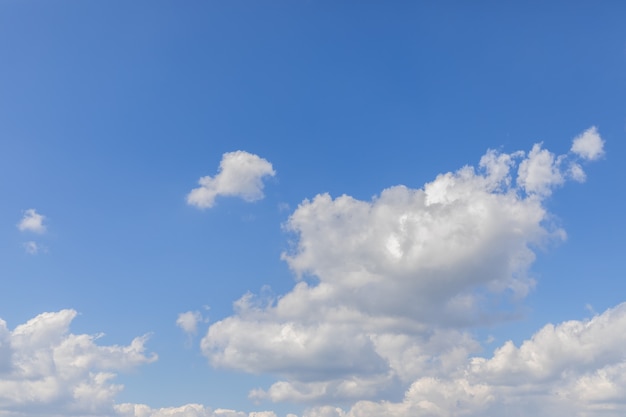 Blue beautiful sky with fresh white clouds.