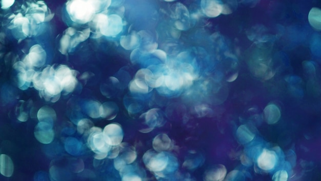 Blue bokeh light texture background shiny sunlight in summer soft blur