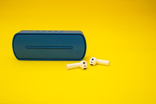 Blue boombox on yellow background colors of the Ukrainian flag