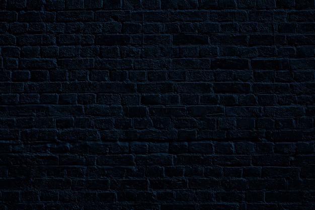 Blue brick wall. Loft interior design. Blue paint of facade.