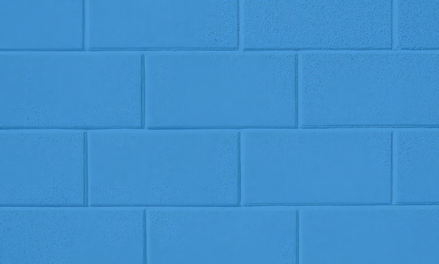 흰색 테두리가 있는 파란색 벽돌 벽