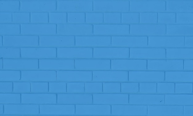 A blue brick wall with a white stripe that says'blue '