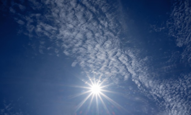 Blue bright sky with beautiful clouds