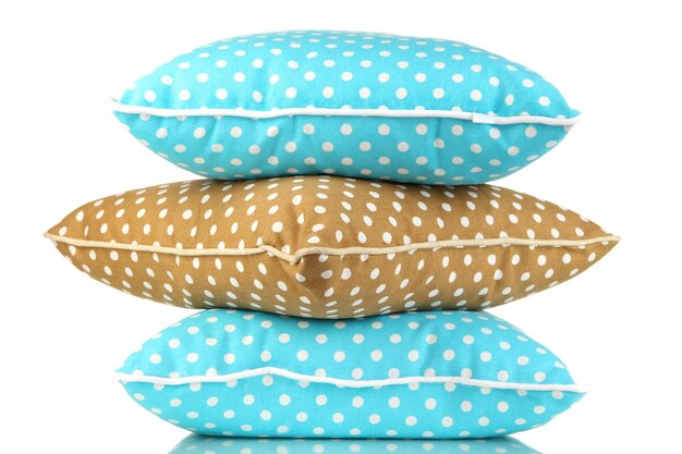 Photo blue and brown bright pillows isolated on white