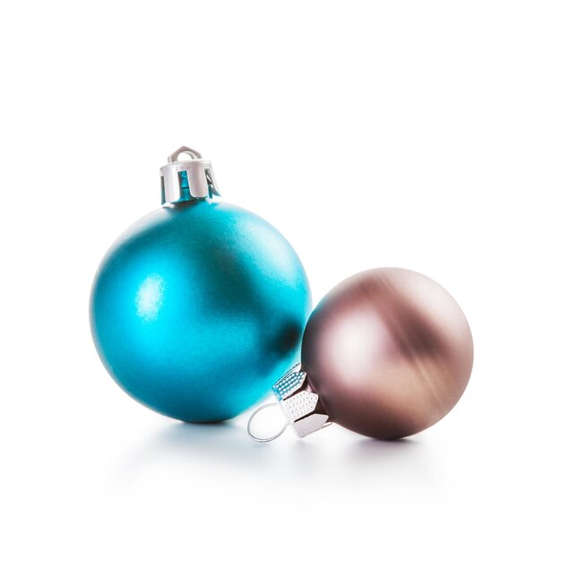 Blue and brown christmas balls on white background clipping path included