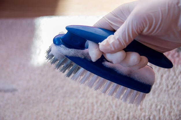 Blue brush on the floor Cleaning