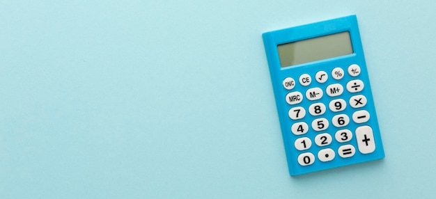 Blue calculator on a colored background