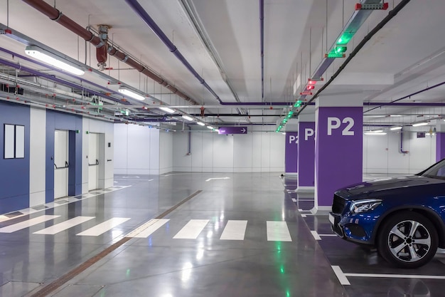 Blue car on the underground parking Underground parking garage