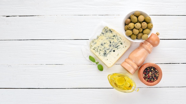 Blue cheese Cheese with mildew Top view On a wooden background Free copy space