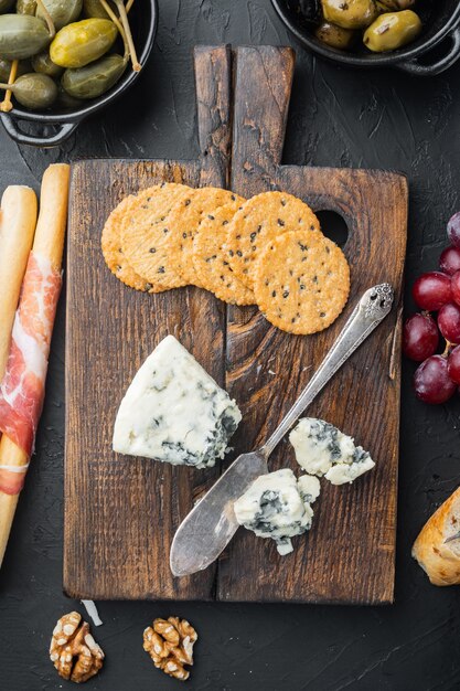 Blue cheese Gorgonzola set, on black, flat lay