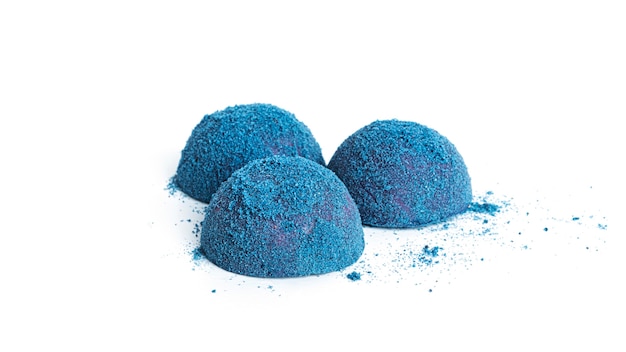 Blue, chocolate candy truffles isolated.