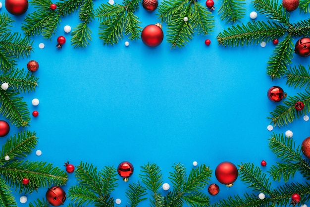 Blue christmas background with christmas decorations. Top view, copy space for festive text