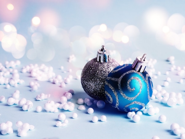 Blue Christmas balls with decoration on blue