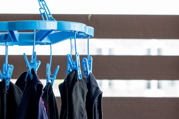 Photo blue clothes peg or clothes line on outdoor