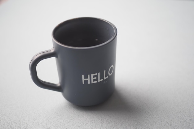 Blue coffee cup with hello word