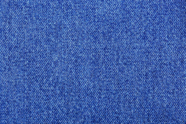 blue color jeans texture factory fabric on white background close up