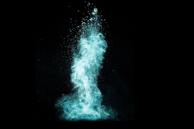 blue color powder explosion on black background.