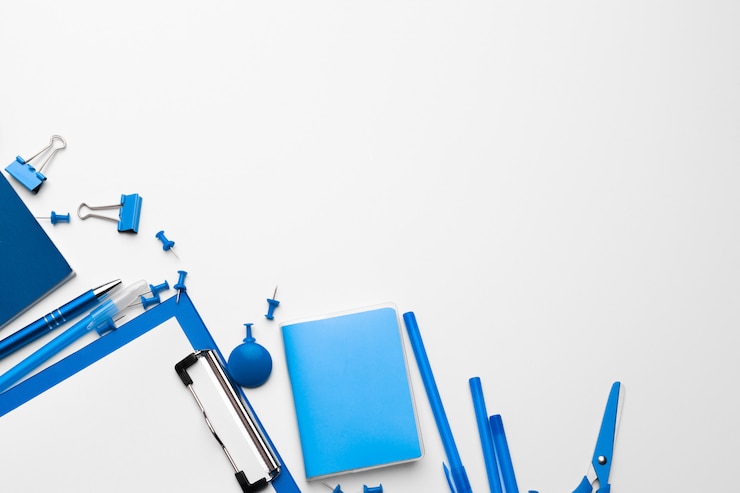 Photo blue color stationery with copy space on white 