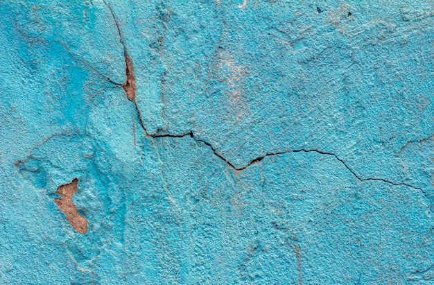 Blue concrete backgroundThe texture of a cracked concrete wall