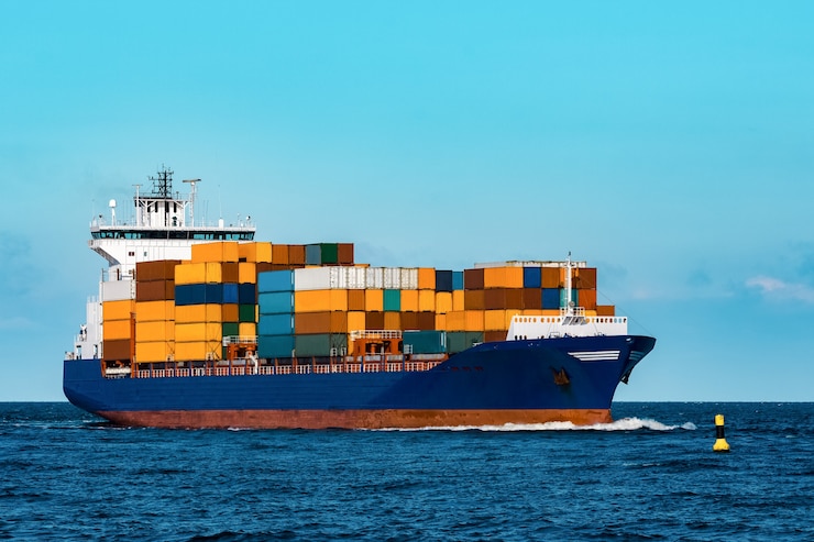 Photo blue container ship in travel. logistics and freight industry