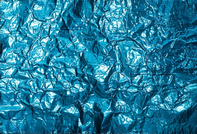 Blue crumpled foil background