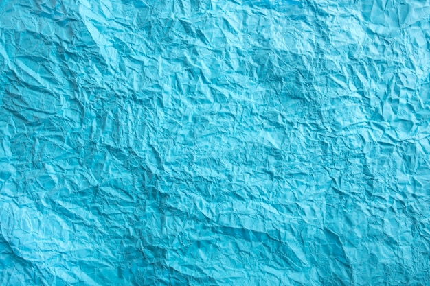 Blue crumpled paper background