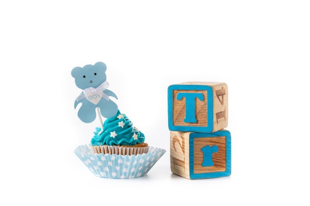 Blue cupcake for baby shower isolated on white background