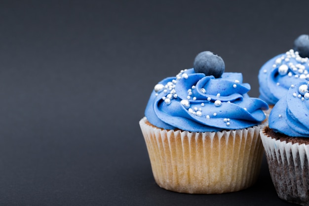 Blue cupcakes with blueberries