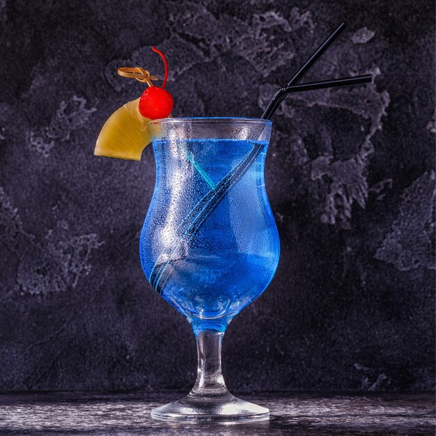 Blue Curacao cocktail decorated with fruit