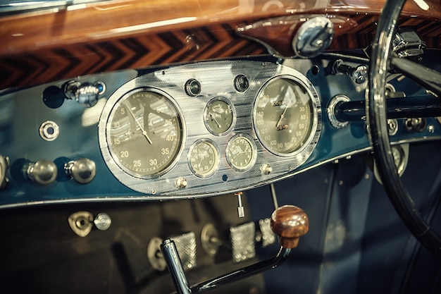 Blue dashboard of a vintage car