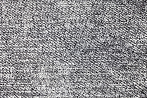 Синяя джинсовая ткань текстуры фона