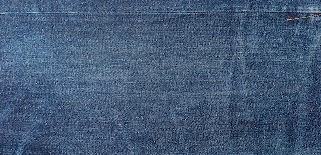 テキスト デザインの背景のコピー スペースを持つ青いデニム ジーンズ テクスチャ バナー キャンバス デニム ファッション テクスチャ パノラマ ファッション バナー