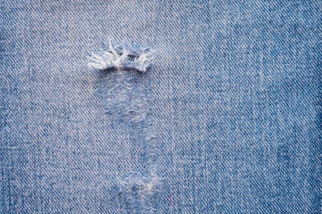 Foto fondo blu del modello di struttura dei jeans del denim