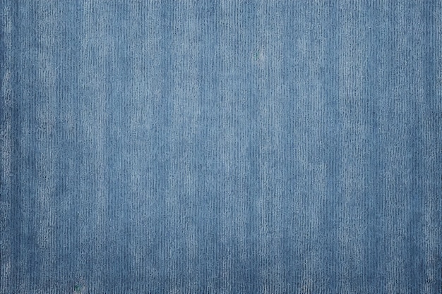 A blue denim wallpaper with a green tree in the background.