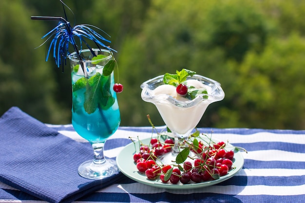 Blue drink with mint and cherry ice. 