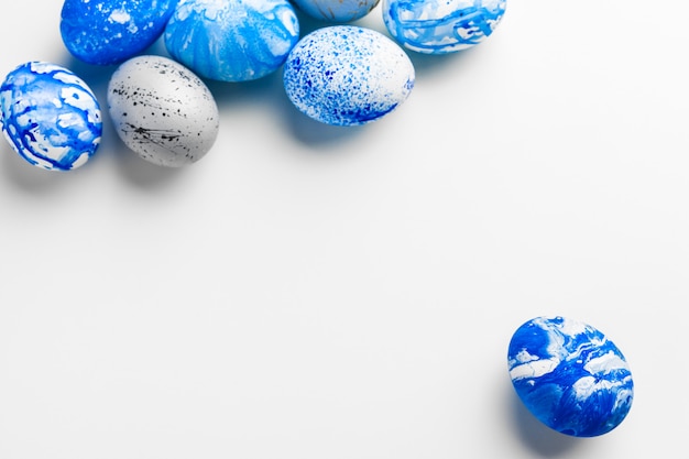 Photo blue easter eggs isolated on white.