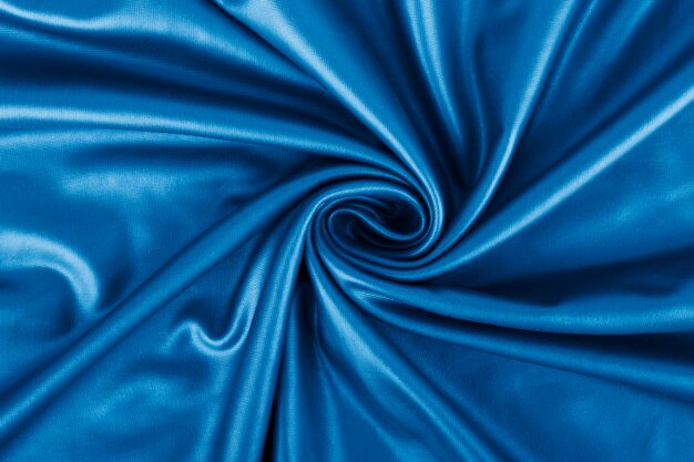 Синяя ткань ткань фоновой текстуры