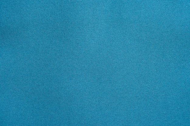 Синий фон текстуры ткани крупным планом