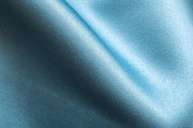 Синий фон текстуры ткани крупным планом