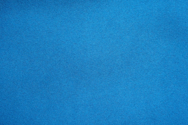 Blue fabric texture background close up