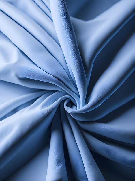 Синяя ткань со спиралевидным узором в центре.