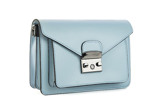 分離された白い背景の上の青いファッション財布ハンドバッグ