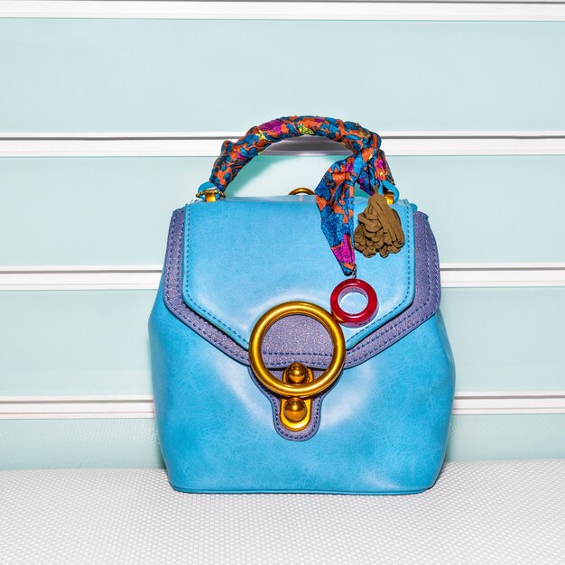 Blue female bag with accessories